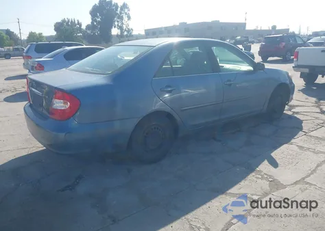 2002 Toyota Camry Le z USA, uszkodzony, nr VIN JTDBE32K520033900